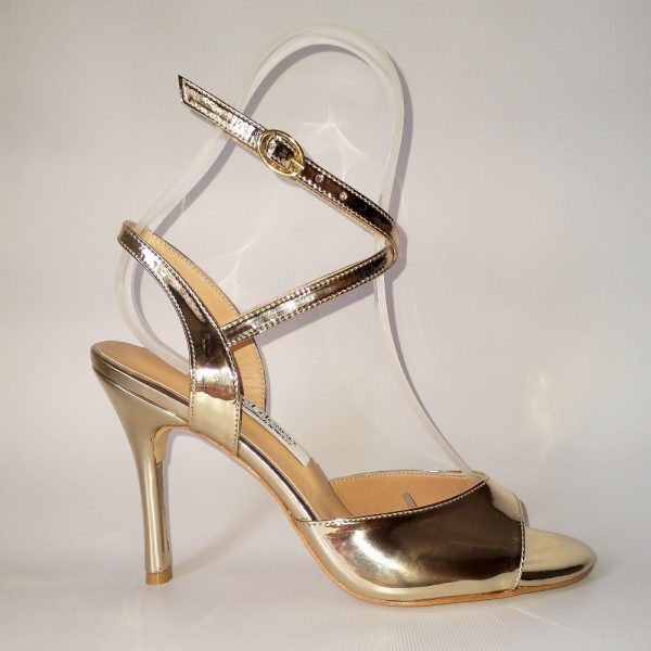 Golden patent leather follower shoes