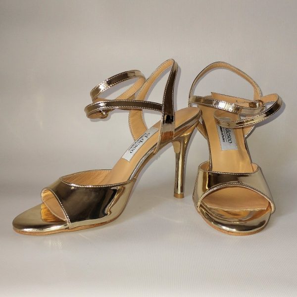 Golden patent leather follower shoes