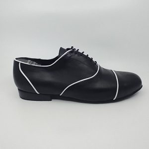 Black & white leather tango leader shoes